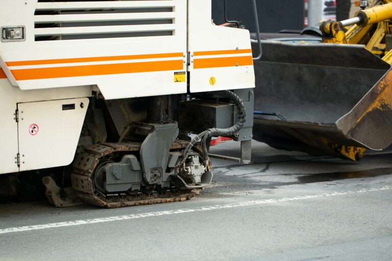 Road repairs. Milling of asphalt for road reconstruction